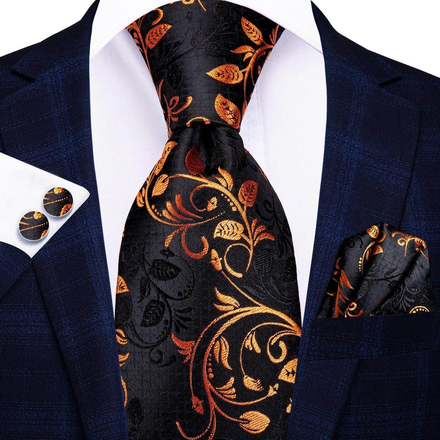 Elegant designer wedding ties for men in black with gold floral pattern, perfect for special occasions