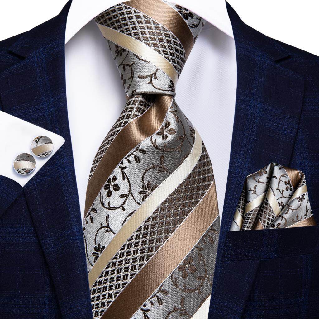Elegant designer wedding ties for men featuring intricate patterns in silver and gold tones