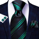 Stylish designer wedding ties for men in dark blue with green stripes, perfect for formal occasions