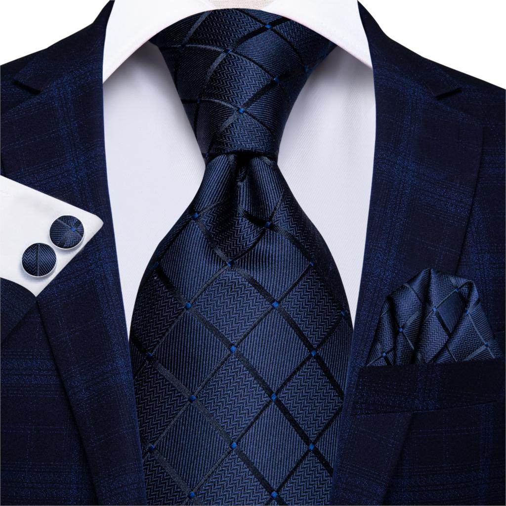 Navy designer wedding ties for men featuring a stylish pattern and matching pocket square