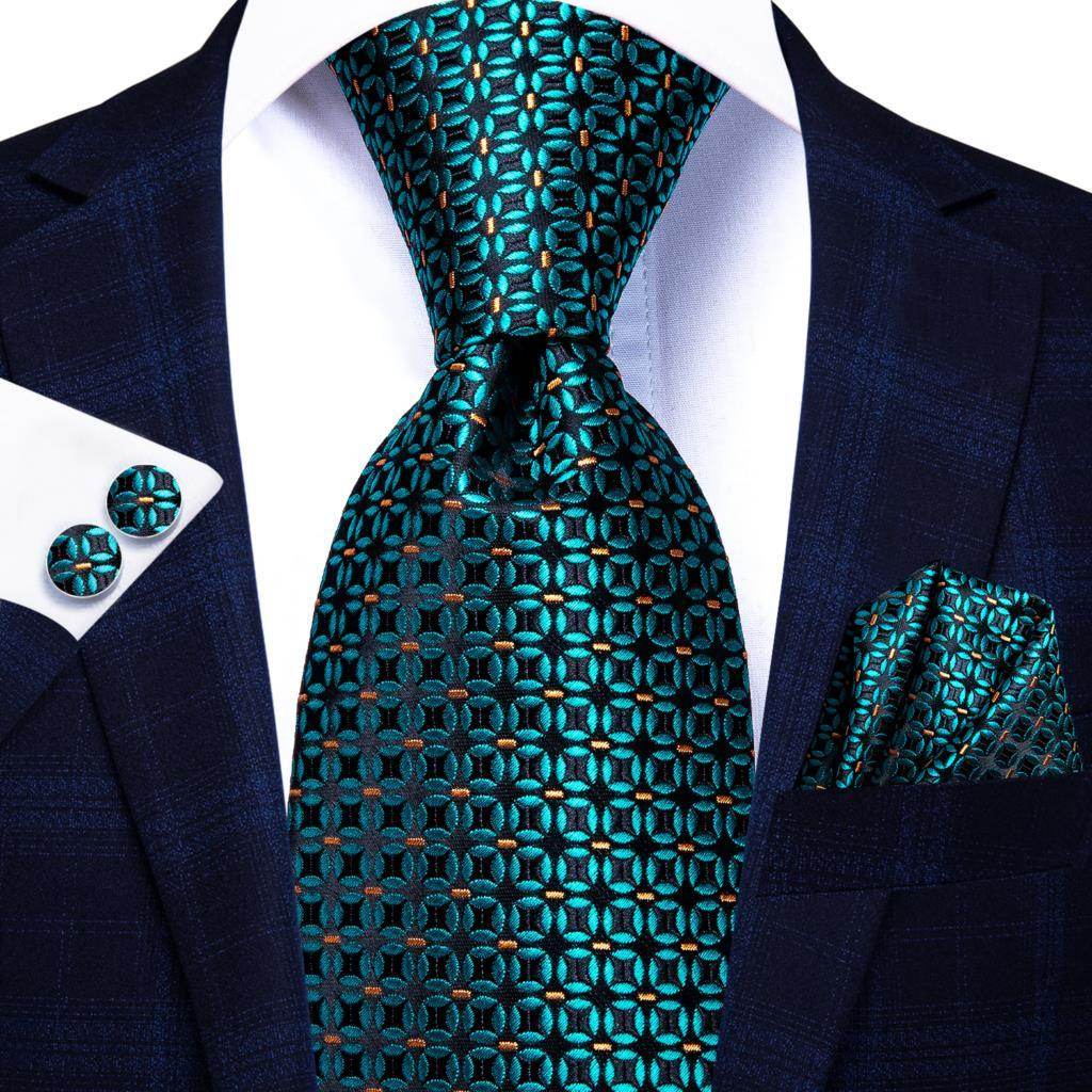 Elegant designer wedding ties for men in teal with intricate patterns, perfect for formal occasions.