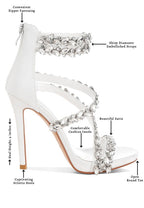Women's white diamante stiletto heel sandals with shiny straps