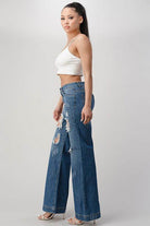 LITZ LA Women's distressed denim pants featuring wide legs and stylish rips for a trendy look