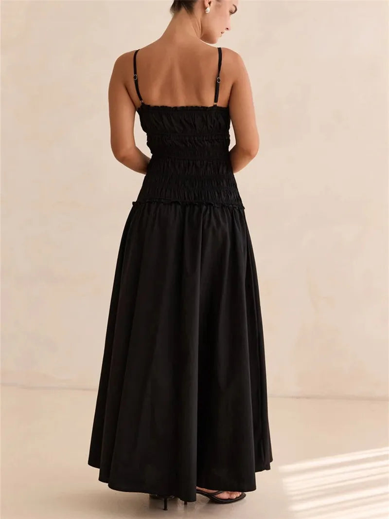 Women's black smocked back maxi dress for summer outings