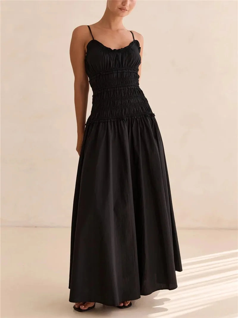 Women's black smocked bodice and maxi dress for summer outings