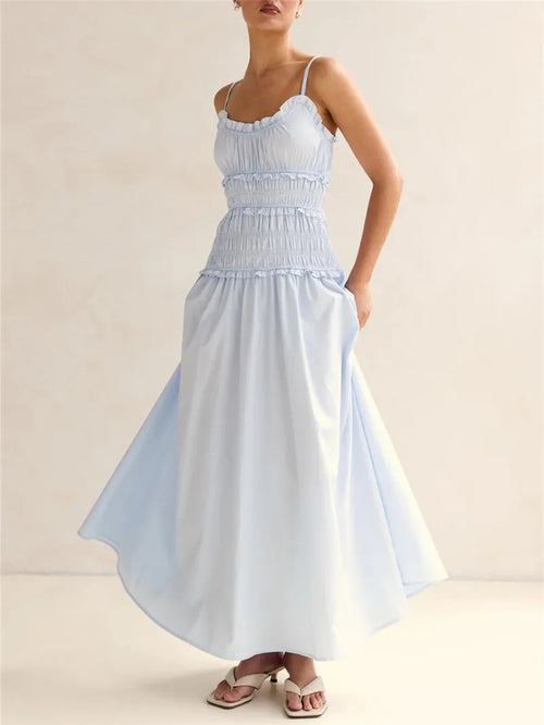 Women's light blue smocked and maxi dress, perfect for summer outings