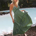 Women's green ruffled dress for the summer, perfect for beach outings