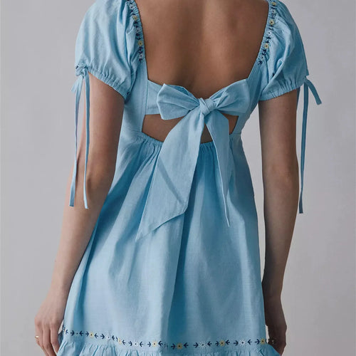 Light blue cotton women's dress for the summer with back bow tie detail