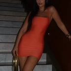 Women's orange summer dress, stretchy fabric, perfect for warm weather