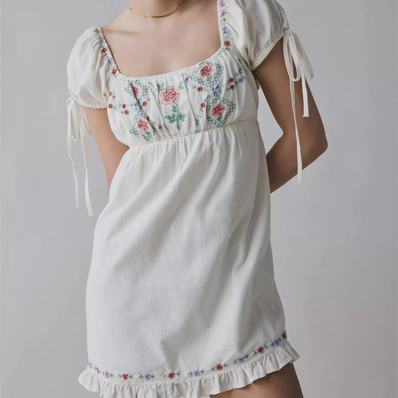 Women's white cotton dress for the summer with floral embroidery