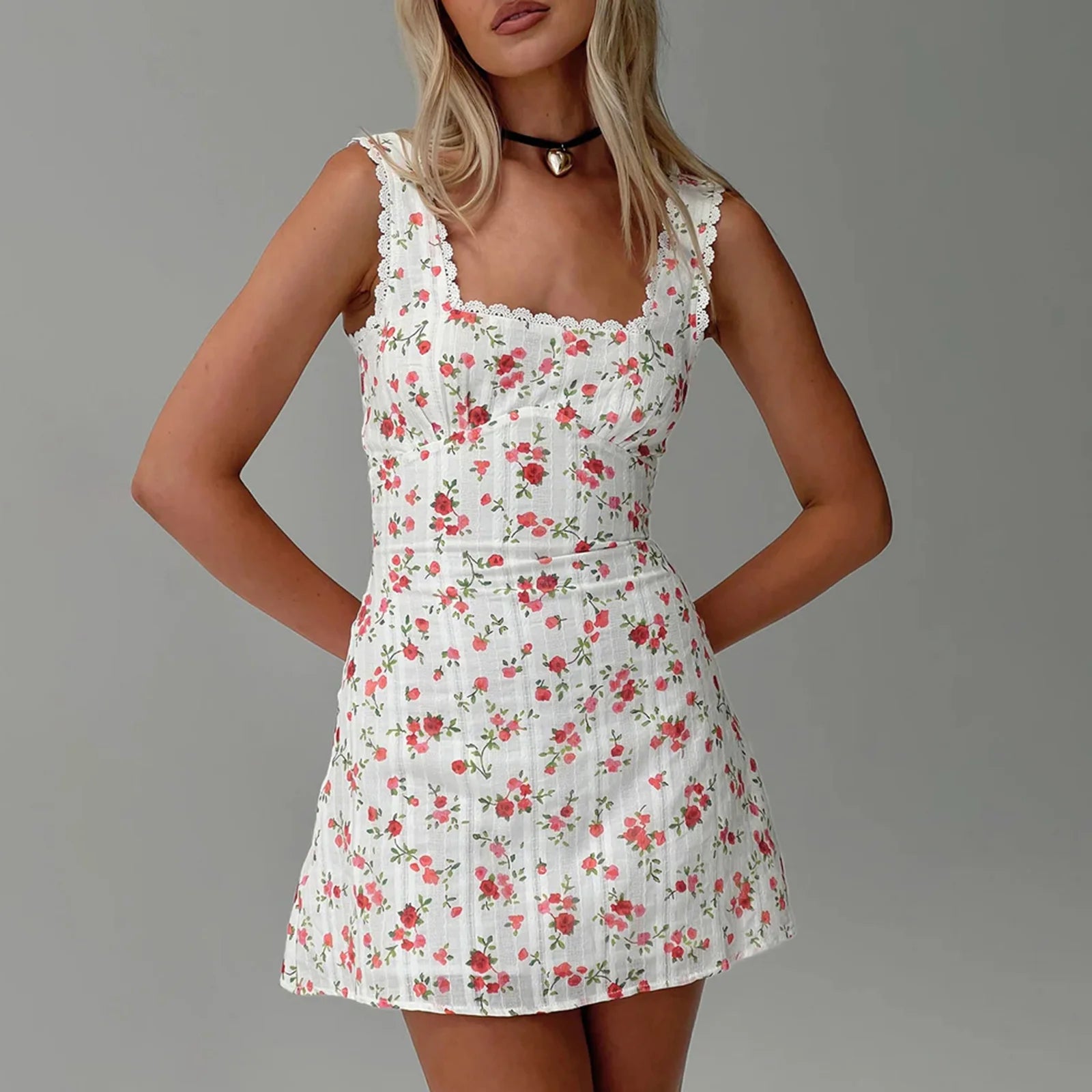 Women's floral mini dress for the summer in white with lace trim