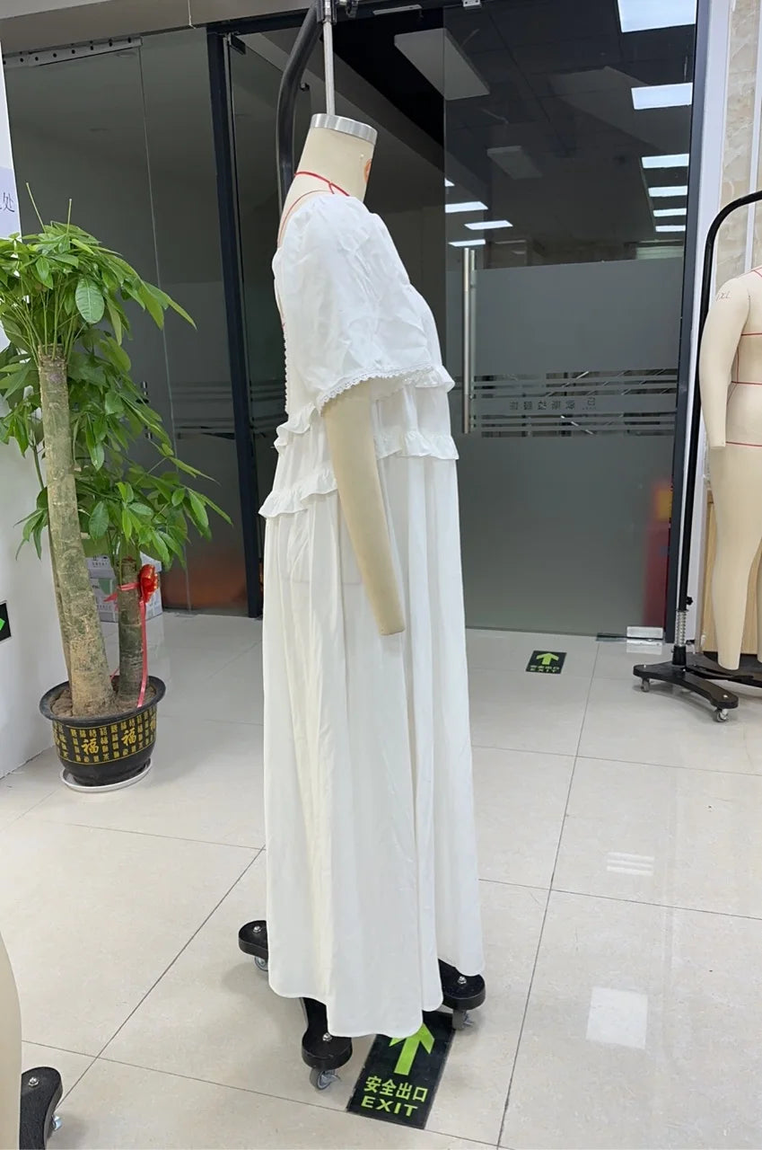 Women's white tiered cotton dress for the summer, perfect for outdoor events
