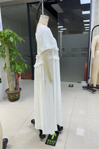 Women's white tiered cotton dress for the summer, perfect for outdoor events