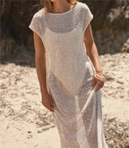 Luxe sheer beach cover-up dress for the summer, perfect for seaside outings