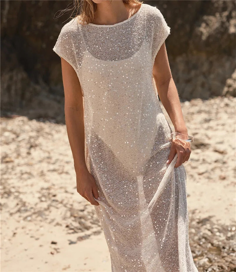Luxe sheer beach cover-up dress for the summer, perfect for seaside outings