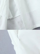 White lightweight summer dress for the summer with zipper detail