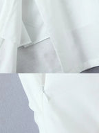 White lightweight summer dress for the summer with zipper detail