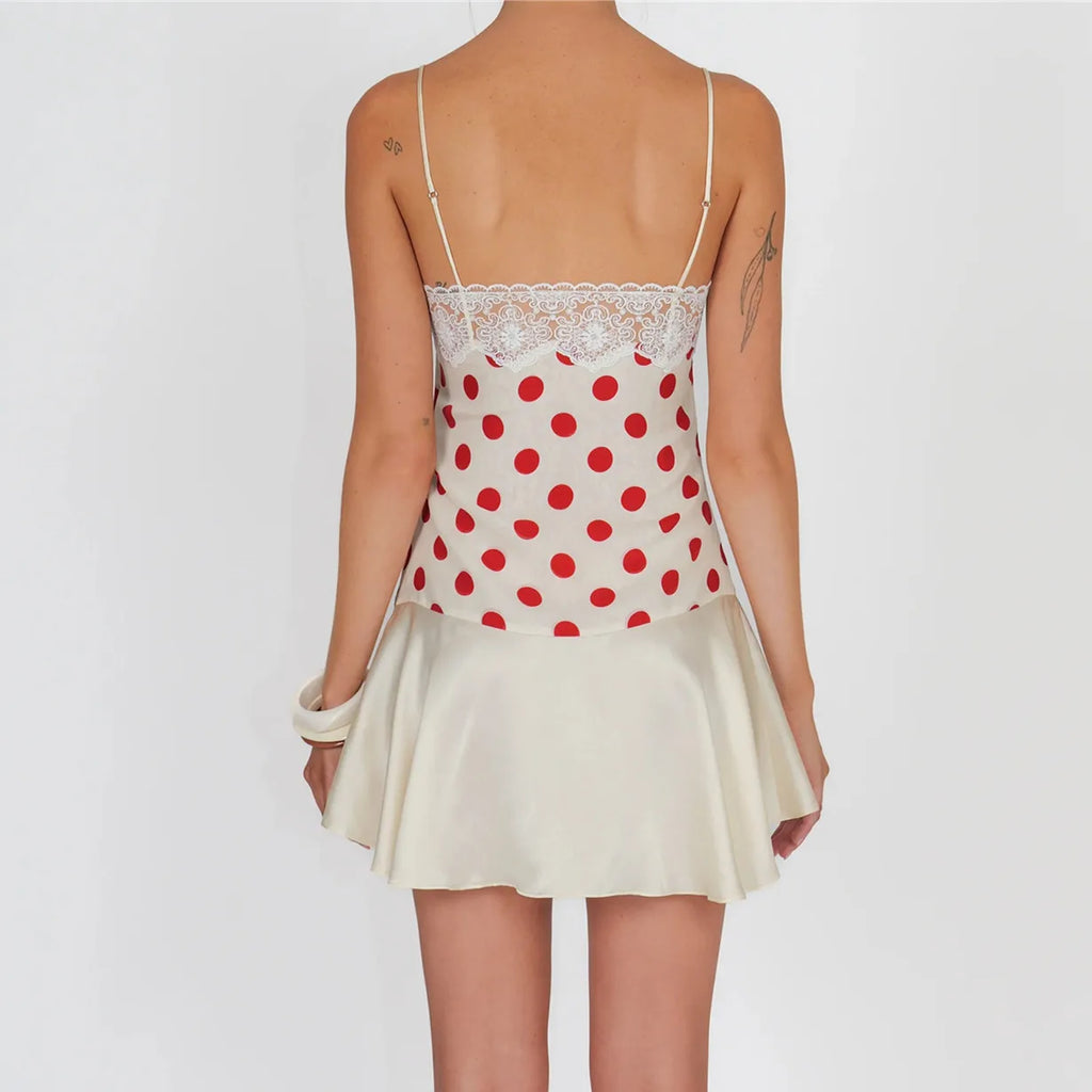 Women's white polka dot mini dress, perfect for summer outings
