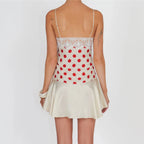 Women's white polka dot mini dress, perfect for summer outings