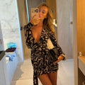 Women's black and white striped mini dress, stylish for casual outings