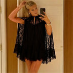 Black lace mini dress with cape sleeves for stylish occasions