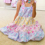 Women's floral mini dress in pastel colors, perfect for summer outings