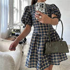 Women's plaid mini dress in blue and green, perfect for casual outings