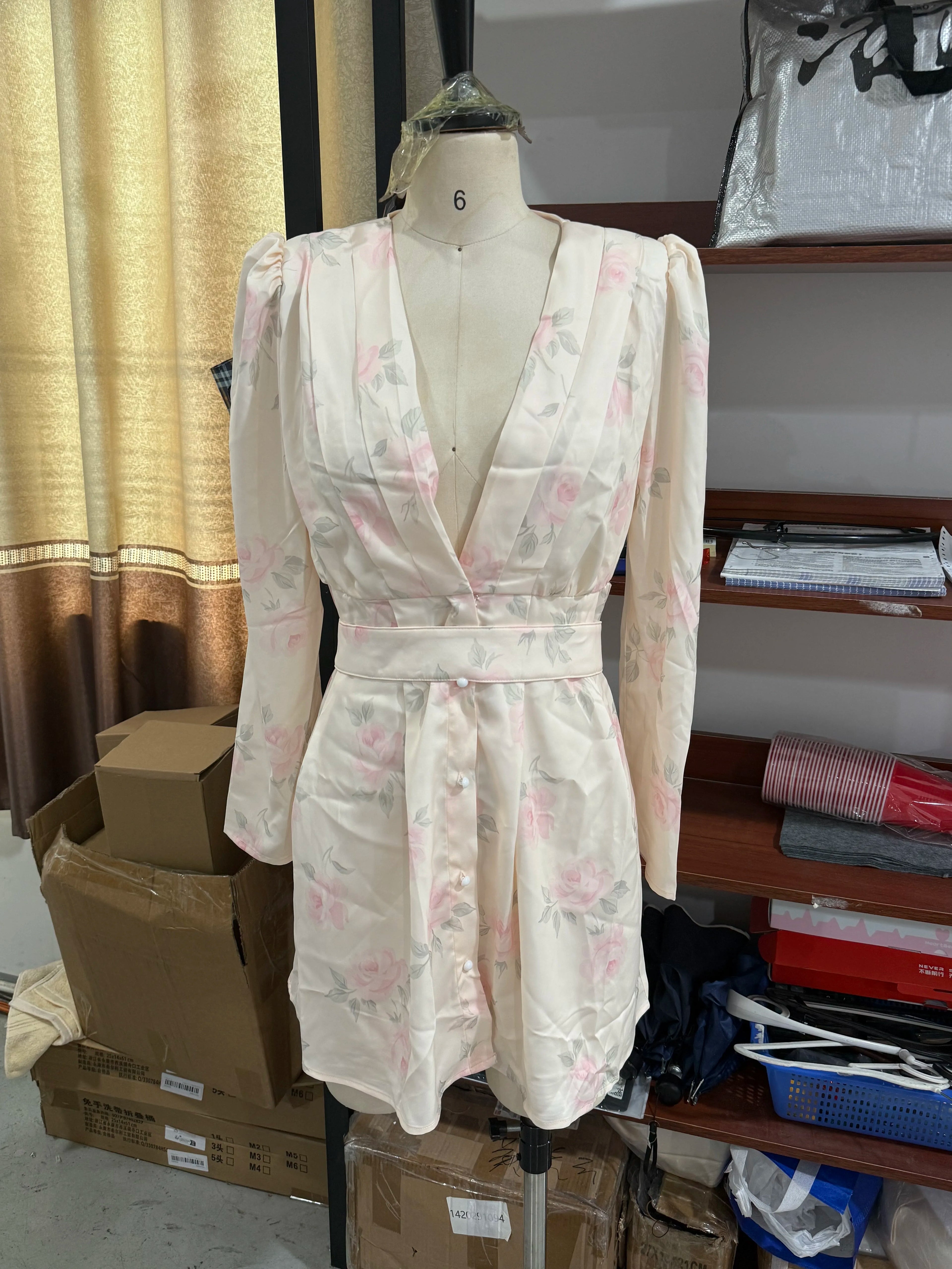 Women's floral mini dress in cream, perfect for casual outings