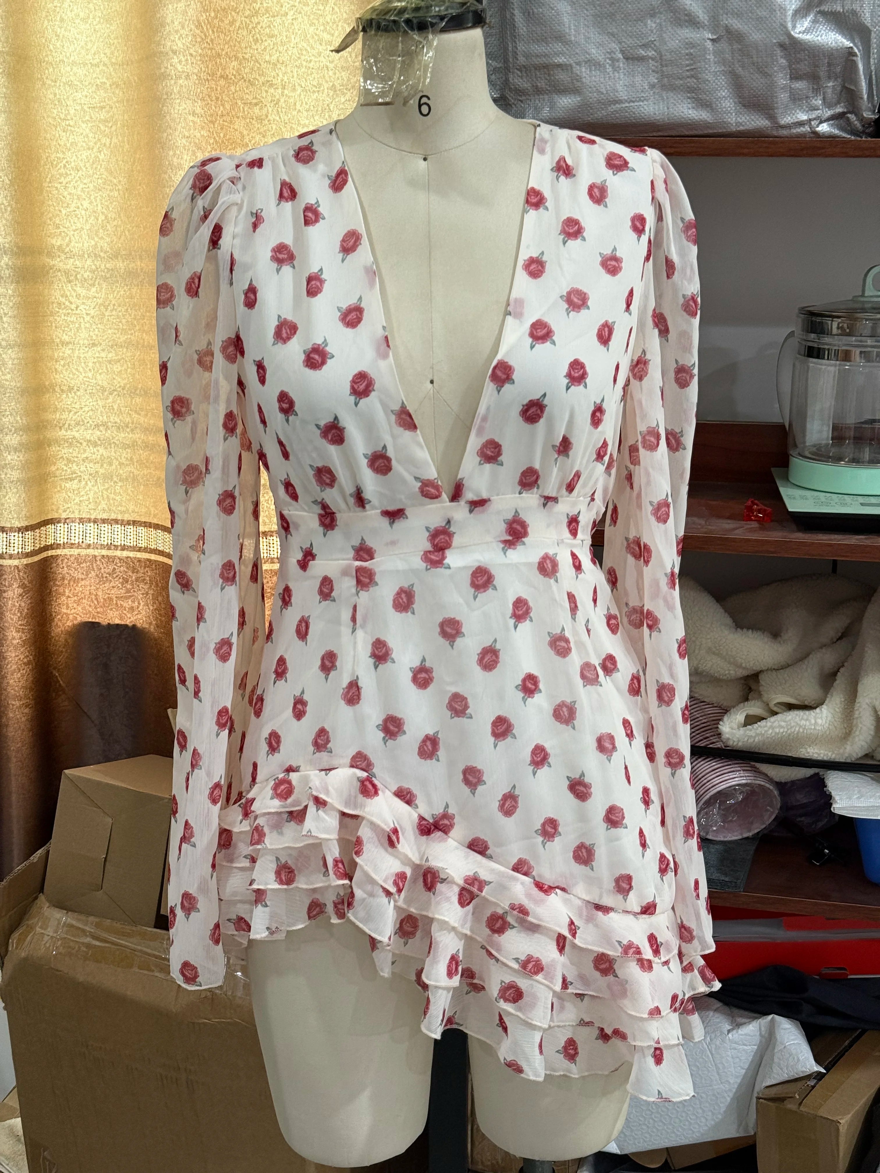 Women's floral mini dress with ruffled hem for casual outings