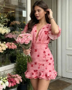 Women's pink mini dress with floral design, perfect for spring outings