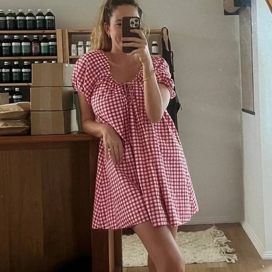 Women's red and white checkered mini dress, perfect for summer outings