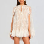 Women's white mini dress with lace detailing for breezy summer outings