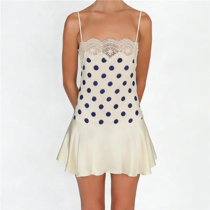 Cream mini dress with navy polka dots, perfect for summer outings