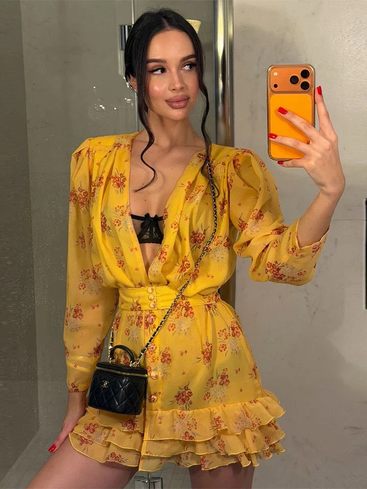 Yellow floral mini dress with ruffled hem, perfect for casual outings