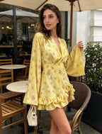 Yellow floral mini dress with ruffled hem, perfect for summer outings