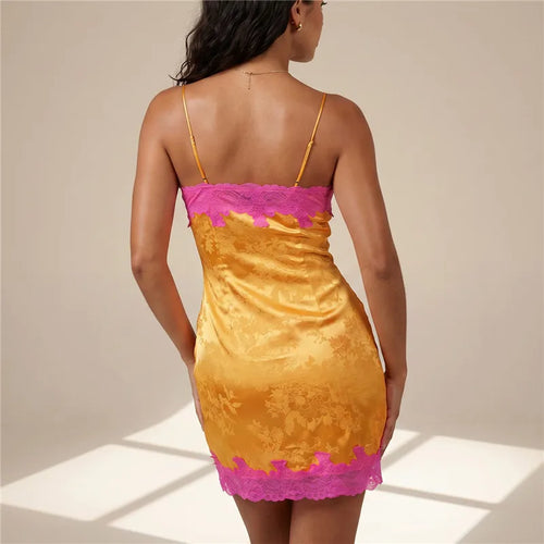 Women's mini dress in yellow satin with pink lace trim, perfect for summer outings