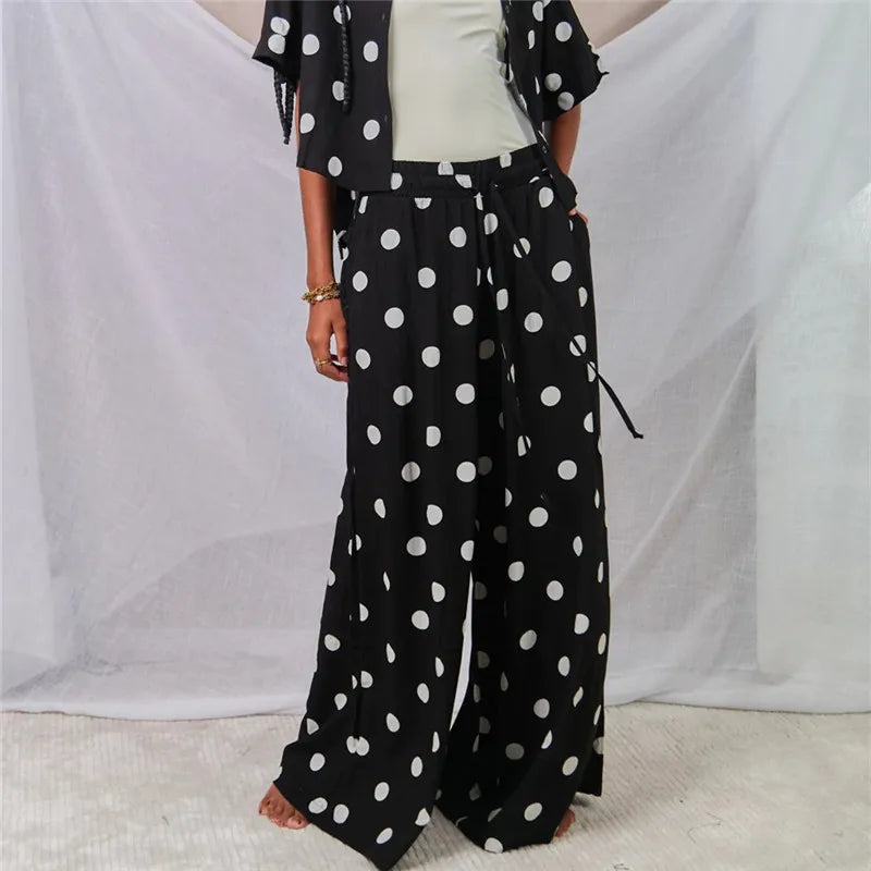 Black women’s dress polka dot outfit, lightweight fabric, perfect for summer outings