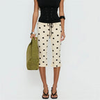 Women's beige dress polka dot cropped pants for casual outings