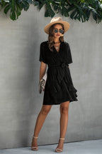 Women's black dress wrap in lightweight fabric, perfect for summer outings