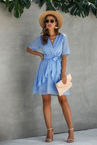 Women's blue polka dot dress wrap, perfect for summer outings