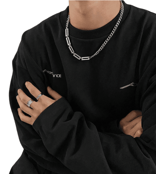 Men's jewelry featuring a stylish dual design necklace chain worn with a black sweatshirt