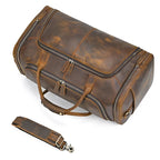 Brown leather duffle bag with comfortable handles, perfect for travel