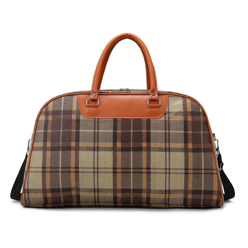 Brown plaid duffle bag with leather accents for travel and gym