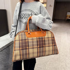 Tartan duffle bag, brown plaid design, perfect for travel
