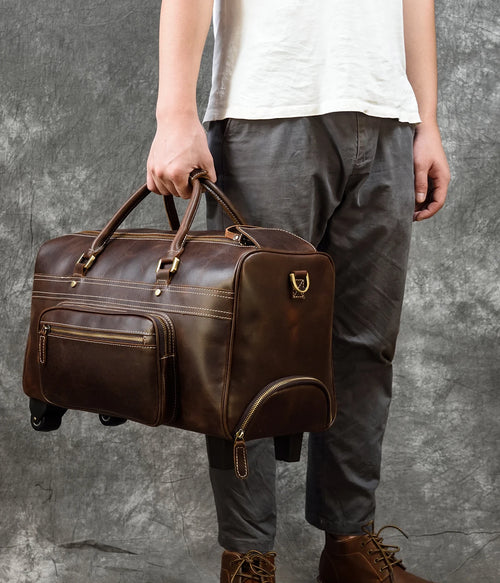 Brown leather duffle bag rolling for stylish travel and convenience
