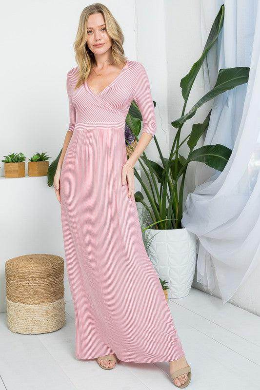 e Luna dusty pink maxi dress with a flattering wrap style and half sleeves, perfect for casual outings