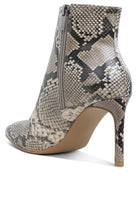 Stylish textured stiletto heel ankle boots in snake print pattern for women by Rag Company
