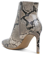 Stylish textured stiletto heel ankle boots in snake print pattern for women by Rag Company