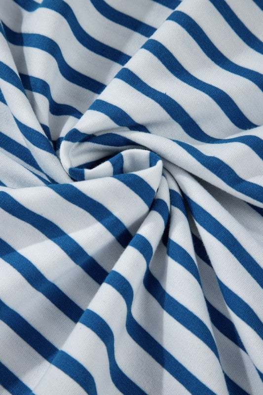 Close-up of fabric showing striped drop shoulder sweatshirt in blue and white colors