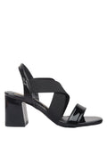 Black sandal with multiple straps on a white background